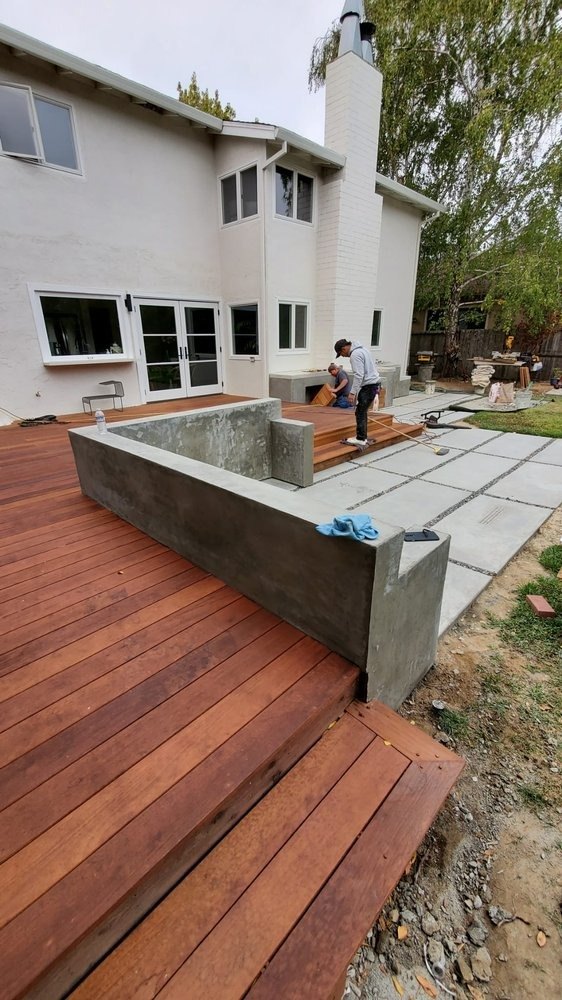 Backyard deck and concrete bench under construction