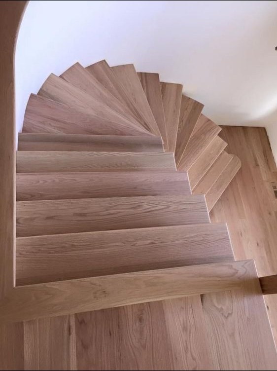 Spiral wood staircase seen from above